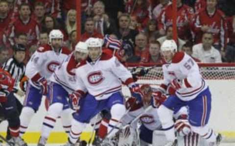 WASHINGTON – APRIL 28: (L-R) Roman Hamrlik, Ryan O’Byrne #20, Maxim Lapierre #40, Jaroslav Halak #41 and Benoit Pouliot #57 of the Montreal Canadiens defend the net against the Washington Capitals in Game Seven of the Eastern Conference Quarterfinals during the 2010 NHL Stanley Cup Playoffs at the Verizon Center on April 28, 2010 in Washington, DC. The Canadiens defeated the Capitals 2-1 to win the series. (Photo by Bruce Bennett/Getty Images)