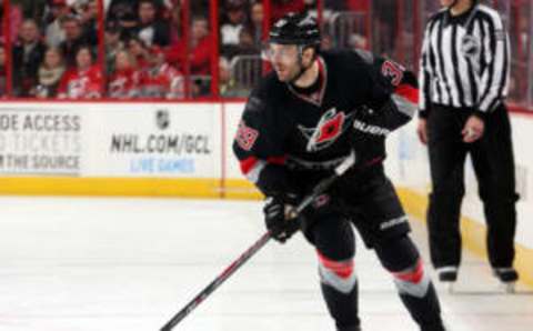 RALEIGH, NC – JANUARY 13: Patrick Dwyer #39 of the Carolina Hurricanes carries the puck during their NHL game against the Colorado Avalanche at PNC Arena on January 13, 2015 in Raleigh, North Carolina. (Photo by Gregg Forwerck/NHLI via Getty Images)