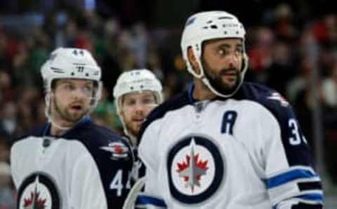 Winnipeg Jets defenseman Dustin Byfuglien (33) and defenseman Josh Morrissey (44) (Caylor Arnold-USA TODAY Sports)