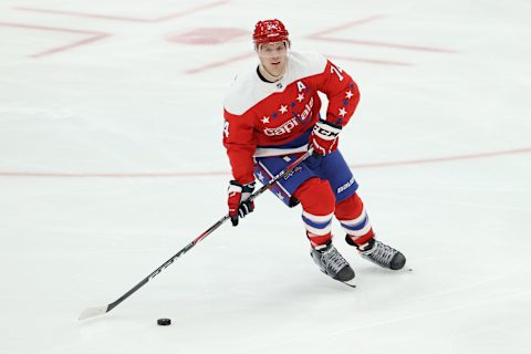 WASHINGTON, DC – FEBRUARY 10: John Carlson #74 of the Washington Capitals skates against the New York Islanders the New York Islanders at Capital One Arena on February 10, 2020 in Washington, DC. (Photo by Patrick Smith/Getty Images)