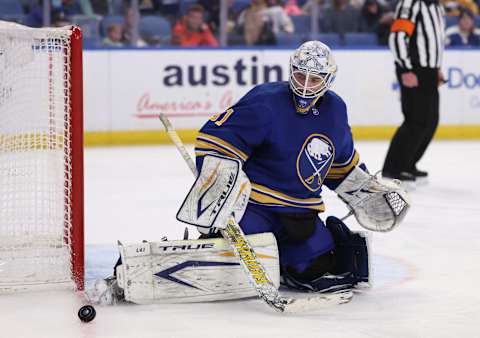 Mar 6, 2022; Buffalo, New York, USA; Buffalo Sabres goaltender Dustin Tokarski (31) makes a pad save during the third period against the Los Angeles Kings at KeyBank Center. Mandatory Credit: Timothy T. Ludwig-USA TODAY Sports