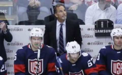 Sep 20, 2016; Toronto, Ontario, Canada; Team USA head coach John Tortorella looks up at the soreboard during the third period against Team Canada in preliminary round play in the 2016 World Cup of Hockey at Air Canada Centre. Team Canada defeated Team USA 4-2. Mandatory Credit: John E. Sokolowski-USA TODAY Sports