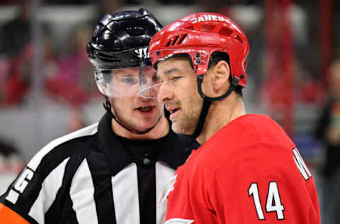 RALEIGH, NORTH CAROLINA – FEBRUARY 16: Justin Williams #14 of the Carolina Hurricanes talks with an official during the second period of their game against the Edmonton Oilers at PNC Arena on February 16, 2020 in Raleigh, North Carolina. (Photo by Grant Halverson/Getty Images)