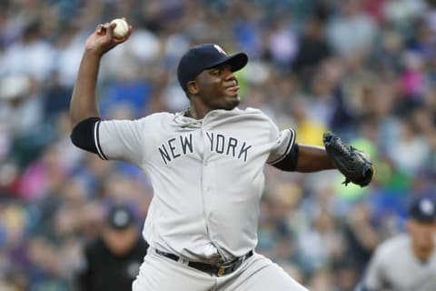 Aug 22, 2016; Seattle, WA, USA; New York Yankees starting pitcher Michael Pineda (35) throws against the Seattle Mariners during the first inning at Safeco Field. Mandatory Credit: Joe Nicholson-USA TODAY Sports