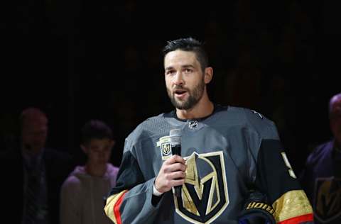 LAS VEGAS, NV – OCTOBER 10: Deryk Engelland #5 of the Vegas Golden Knights addresses the fans on the tragedy of the prior week in Las Vegas before the game between the Vegas Golden Knights and the Arizona Coyotes.