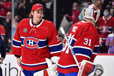 MONTREAL, QC – APRIL 29: Goaltender Sam Montembeault #35 of the Montreal Canadiens smiles at teammate Carey Price #31 after their 10-2 victory against the Florida Panthers at Centre Bell on April 29, 2022 in Montreal, Canada. (Photo by Minas Panagiotakis/Getty Images)