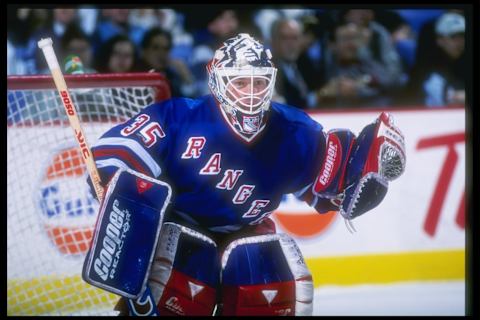 13 Dec 1996: Goaltender Mike Richter of the New York Rangers looks on during a game against the Buffalo Sabres at the Marine Midland Arena in Buffalo, New York. The Rangers won the game, 3-0.