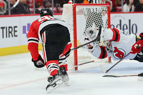 Vitek Vanecek #41 of the New Jersey Devils robs Tyler Johnson. (Photo by Michael Reaves/Getty Images)