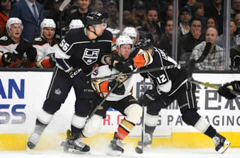 LOS ANGELES, CA – JANUARY 13: Los Angeles Kings Defenceman Kurtis MacDermid (56) and Los Angeles Kings Left Wing Marian Gaborik (12) violently check Anaheim Ducks Right Wing Ondrej Kase (25) at mid-ice. (Photo by Chris Williams/Icon Sportswire via Getty Images)