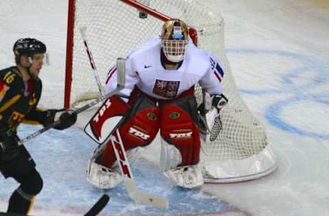 Turin, ITALY: Picture of Czech goalkeeper Dominik Hasek (R) taken during the ice hockey men’s preliminary round Czech Republic vs Germany at the 2006 Winter Olympics, 15 February 2006 at the Palasport Olimpico in Turin. Hasek played just six minutes of the Czechs’ first game before getting hurt. “Our medical staff decided that I’m not able to play,” said Ottawa Senators All-Star netminder Hasek. “It’s over. Also I don’t want to get hurt for the rest of the National Hockey League but playing in the Olympics was one of my dreams.” AFP PHOTO MARC-ANTOINE BAUDOUX (Photo credit should read MARC-ANTOINE BAUDOUX/AFP via Getty Images)