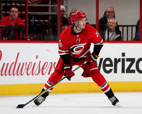 RALEIGH, NC – OCTOBER 27: Brett Pesce #22 of the Carolina Hurricanes controls a puck on the ice during an NHL game against the St. Louis Blues on October 27, 2017 at PNC Arena in Raleigh, North Carolina. (Photo by Gregg Forwerck/NHLI via Getty Images)