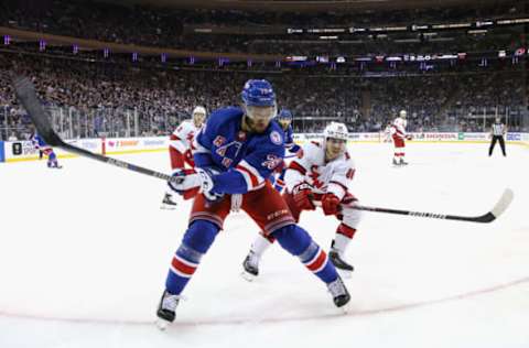 NEW YORK, NEW YORK – MAY 24: Teuvo Teravainen #86 of the Carolina Hurricanes checks K’Andre Miller #79 of the New York Rangers in Game Four of the Second Round of the 2022 Stanley Cup Playoffs at Madison Square Garden on May 24, 2022, in New York City. The Rangers defeated the Hurricanes 4-1. (Photo by Bruce Bennett/Getty Images)