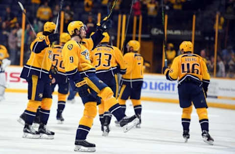 NHL Team Name Origins: Nashville Predators left wing Filip Forsberg (9) celebrates after a win against the Dallas Stars at Bridgestone Arena. The Predators won 5-2. Mandatory Credit: Christopher Hanewinckel-USA TODAY Sports