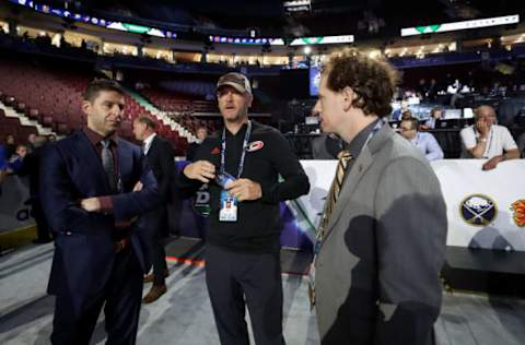 VANCOUVER, BRITISH COLUMBIA – JUNE 22: Tom Dundon (C) of the Carolina Hurricanes attends the 2019 NHL Draft at Rogers Arena on June 22, 2019 in Vancouver, Canada. (Photo by Bruce Bennett/Getty Images)