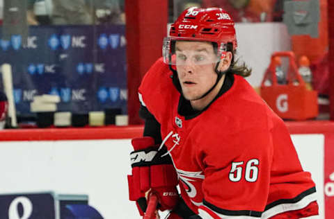 RALEIGH, NC – SEPTEMBER 29: Carolina Hurricanes left wing Erik Haula (56) skates the puck up ice during an NHL Preseason game between the Washington Capitals and the Carolina Hurricanes on September 29, 2019 at the PNC Arena in Raleigh, NC. (Photo by Greg Thompson/Icon Sportswire via Getty Images)