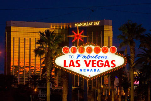 LAS VEGAS, NV – DECEMBER 23: The famous neon “Welcome to Las Vegas” sign at the south entrance to town is viewed in front of the Mandalay Bay Hotel & Casino on December 23, 2010 in Las Vegas, Nevada. Las Vegas, the popular Southwest desert tourist getaway, appears to be making a slow economic recovery following a tough global recession. (Photo by George Rose/Getty Images)