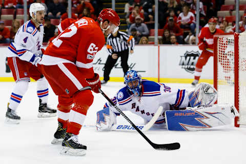 Jan 22, 2017; Detroit, MI, USA; New York Rangers goalie Henrik Lundqvist (30) makes the save on Detroit Red Wings left wing Thomas Vanek (62) in the first period at Joe Louis Arena. Mandatory Credit: Rick Osentoski-USA TODAY Sports