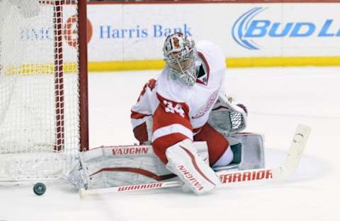 Just saving the puck. Mandatory Credit: Marilyn Indahl-USA TODAY Sports