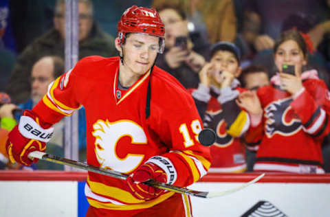 Jan 21, 2017; Calgary, Alberta, CAN; Calgary Flames left wing Matthew Tkachuk (19) controls the puck during warm ups prior to the game against the Edmonton Oilers at Scotiabank Saddledome. Mandatory Credit: Sergei Belski-USA TODAY Sports