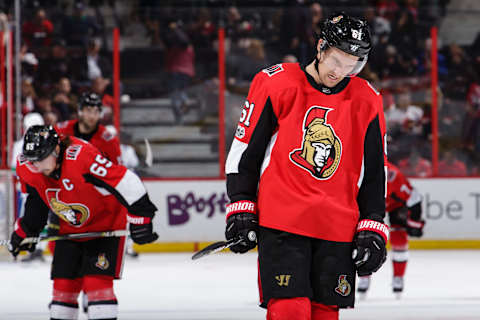 OTTAWA, ON – OCTOBER 17: Mark Stone #61 and Erik Karlsson #65 of the Ottawa Senators react after losing to the Vancouver Canucks at Canadian Tire Centre on October 17, 2017 in Ottawa, Ontario, Canada. (Photo by Jana Chytilova/Freestyle Photography/Getty Images) *** Local Caption ***