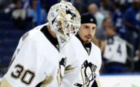 May 18, 2016; Tampa, FL, USA;Pittsburgh Penguins goalie Marc-Andre Fleury (29) talks with goalie Matt Murray (30) after game three of the Eastern Conference Final of the 2016 Stanley Cup Playoffs at Amalie Arena. Pittsburgh Penguins defeated the Tampa Bay Lightning 4-2. Mandatory Credit: Kim Klement-USA TODAY Sports