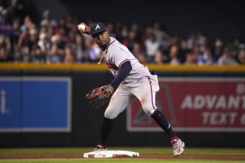 Jun 3, 2023; Phoenix, Arizona, USA; Atlanta Braves second baseman Ozzie Albies (1) throws to first base to complete a double play against the Arizona Diamondbacks during the fourth inning at Chase Field. Mandatory Credit: Joe Camporeale-USA TODAY Sports