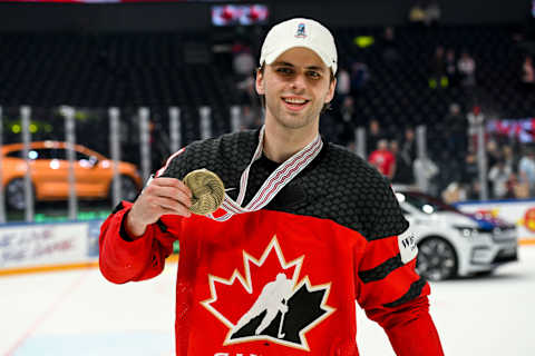 TAMPERE, FINLAND – MAY 28: Adam Fantilli of Canada shows the gold medal during the 2023 IIHF Ice Hockey World Championship Finland – Latvia game between Canada and Germany at Nokia Arena on May 28, 2023 in Tampere, Finland. (Photo by Andrea Branca/Eurasia Sport Images/Getty Images)