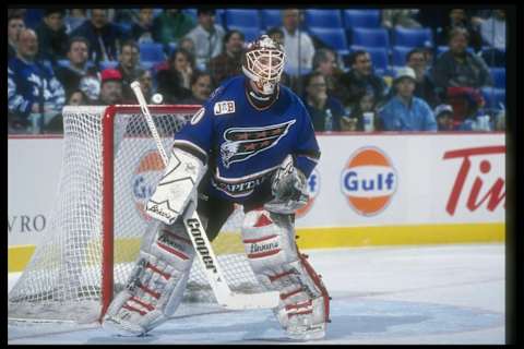 2 Feb 1997: Goaltender Jim Carey of the Washington Capitals looks on during a game against the Buffalo Sabres at the Marine Midland Arena in Buffalo, New York. The game was a tie, 2-2. Mandatory Credit: Rick Stewart /Allsport