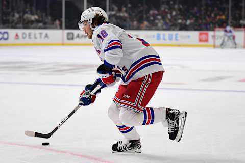 Jan 10, 2022; Los Angeles, California, USA; New York Rangers left wing Artemi Panarin (10) controls the puck against the Los Angeles Kings during the first period at Crypto.com Arena. Mandatory Credit: Gary A. Vasquez-USA TODAY Sports