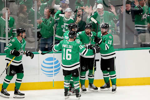 DALLAS, TEXAS – JANUARY 27: Jamie Benn #14 of the Dallas Stars celebrates after scoring the game winning goal against Andrei Vasilevskiy #88 of the Tampa Bay Lightning in the first overtime period at American Airlines Center on January 27, 2020 in Dallas, Texas. (Photo by Tom Pennington/Getty Images)