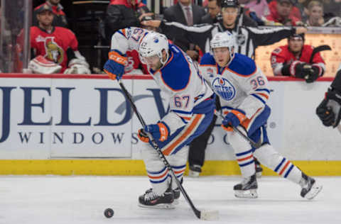 Jan 8, 2017; Ottawa, Ontario, CAN; Edmonton Oilers left wing Benoit Pouliot (67) skates with the puck in the first period against the Ottawa Senators at Canadian Tire Centre. Mandatory Credit: Marc DesRosiers-USA TODAY Sports