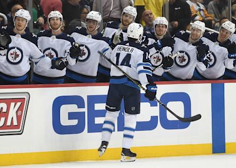 Ville Heinola #14 of the Winnipeg Jets. (Photo by Justin Berl/Getty Images)