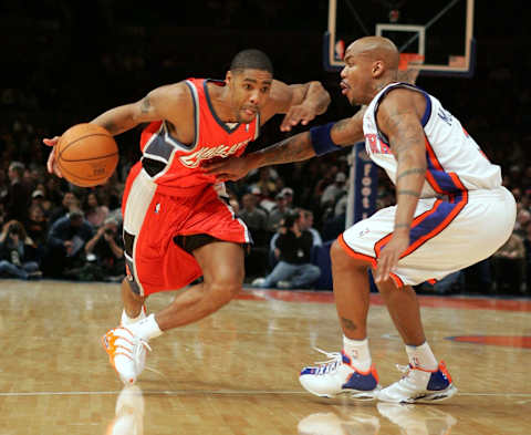 NEW YORK – DECEMBER 26: Jason Hart #1 of the Charlotte Bobcats dribbles to the net against Stephon Marbury #3 of the New York Knicks during the first half of their game on December 26, 2004 at Madison Square Garden in New YorkCity. NOTE TO USER: User expressly acknowledges and agrees that, by downloading and/or using this Photograph, user is consenting to the terms and conditions of the Getty Images License Agreement. (Photo by Jim McIsaac/Getty Images)