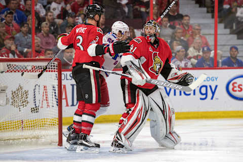 Apr 27, 2017; Ottawa, Ontario, CAN; New York Rangers right wing Rick Nash (61) crowds the net behind Ottawa Senators goalie Craig Ansderson (41) in the first period of game one in the second round of the 2017 Stanley Cup Playoffs at Canadian Tire Centre. Mandatory Credit: Marc DesRosiers-USA TODAY Sports