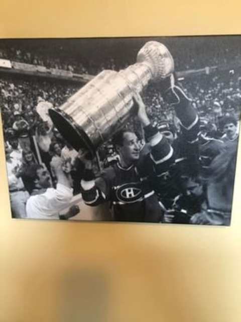 Norris, Danny’s brother, is shown bottom left holding the Stanley Cup with Bob Gainey.