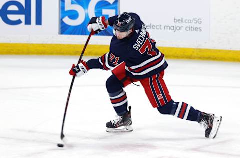 Mar 18, 2022; Winnipeg, Manitoba, CAN; Winnipeg Jets left wing Evgeny Svechnikov (71) warms up before a game against the Boston Bruins at Canada Life Centre. Mandatory Credit: James Carey Lauder-USA TODAY Sports