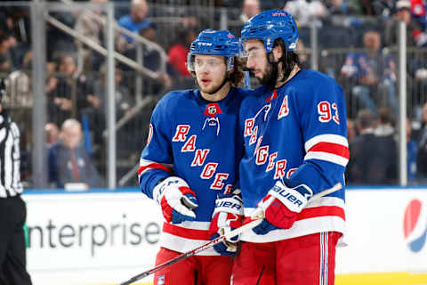 Artemi Panarin #10 and Mika Zibanejad #93 of the New York Rangers