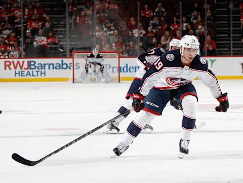 NEWARK, NEW JERSEY – OCTOBER 30: Liam Foudy #19 of the Columbus Blue Jackets skates against the New Jersey Devils at the Prudential Center on October 30, 2022 in Newark, New Jersey. The Devils defeated the Blue Jackets 7-1. (Photo by Bruce Bennett/Getty Images)