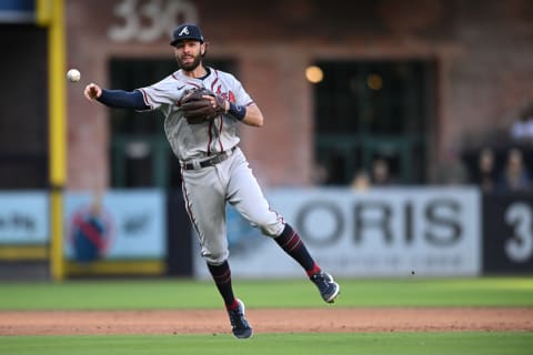 Apr 17, 2022; San Diego, California, USA; Atlanta Braves shortstop Dansby Swanson throws to first base on a ground out by San Diego Padres catcher Austin Nola (not pictured) during the sixth inning at Petco Park. Mandatory Credit: Orlando Ramirez-USA TODAY Sports