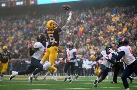 Minneapolis, MN-October 5: Gophers wide receiver Tyler Johnson (6) caught a touchdown pass in the second quarter in traffic against Illinois. (Photo by Aaron Lavinsky/Star Tribune via Getty Images)