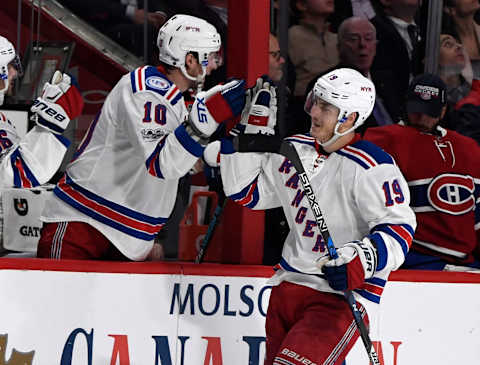 Apr 20, 2017; Montreal, Quebec, CAN; New York Rangers forward Jesper Fast (19) reacts with teammates after scoring a goal against the Montreal Canadiens during the first period in game five of the first round of the 2017 Stanley Cup Playoffs at the Bell Centre. Mandatory Credit: Eric Bolte-USA TODAY Sports