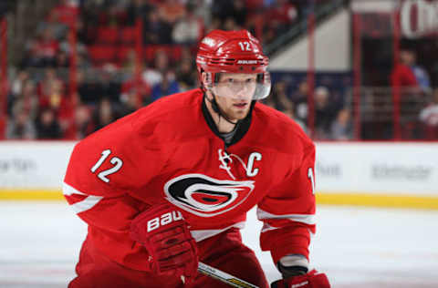 RALEIGH, NC – FEBRUARY 19: Eric Staal #12 of the Carolina Hurricanes skates for position on the ice during an NHL game against the San Jose Sharks at PNC Arena on February 19, 2016 in Raleigh, North Carolina. (Photo by Gregg Forwerck/NHLI via Getty Images)