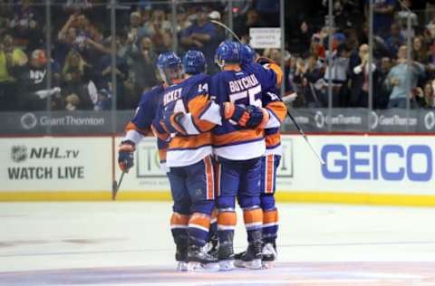 Oct 21, 2016; Brooklyn, NY, USA; New York Islanders defenseman Johnny Boychuk (55) celebrates scoring the game winning goal during the third period against Arizona Coyotes at Barclays Center. New York Islanders won 3-2. Mandatory Credit: Anthony Gruppuso-USA TODAY Sports