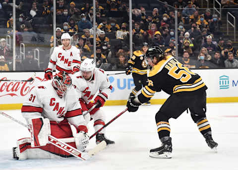 Jan 18, 2022; Boston, Massachusetts, USA; Carolina Hurricanes goaltender Frederik Andersen (31) makes a save on Boston Bruins left wing Erik Haula (56) during the third period at TD Garden. Mandatory Credit: Bob DeChiara-USA TODAY Sports