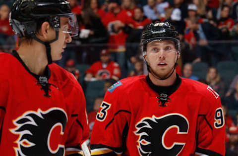 CALGARY, AB – OCTOBER 18: Sam Bennett #93 of the Calgary Flames chats with teammate Mikael Backlund #11 before the face off against the Buffalo Sabres at Scotiabank Saddledome on October 18, 2016 in Calgary, Alberta, Canada. (Photo by Gerry Thomas/NHLI via Getty Images)