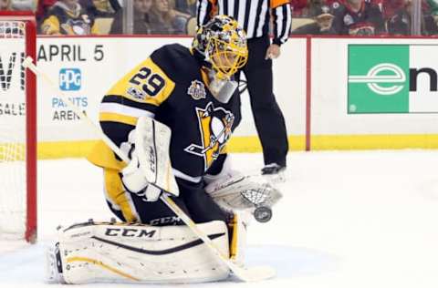 Mar 29, 2017; Pittsburgh, PA, USA; Pittsburgh Penguins goalie Marc-Andre Fleury (29) makes a save against the Chicago Blackhawks during the first period at the PPG PAINTS Arena. Mandatory Credit: Charles LeClaire-USA TODAY Sports