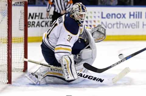 Apr 2, 2016; New York, NY, USA; Buffalo Sabres goalie Chad Johnson (31) makes a save during the second period against the New York Rangers at Madison Square Garden. Mandatory Credit: Adam Hunger-USA TODAY Sports