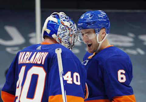 Semyon Varlamov #40 and Ryan Pulock #6 of the New York Islanders. (Photo by Bruce Bennett/Getty Images)