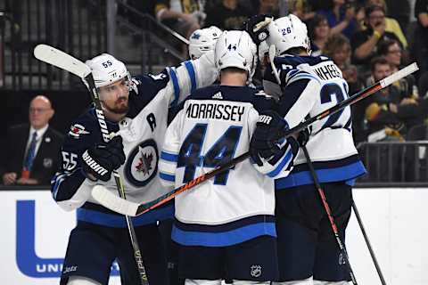 LAS VEGAS, NV – MAY 16: Mark Scheifele #55 of the Winnipeg Jets celebrates with his teammates after scoring a third-period goal against the Vegas Golden Knights in Game Three of the Western Conference Finals during the 2018 NHL Stanley Cup Playoffs at T-Mobile Arena on May 16, 2018 in Las Vegas, Nevada. (Photo by Ethan Miller/Getty Images)