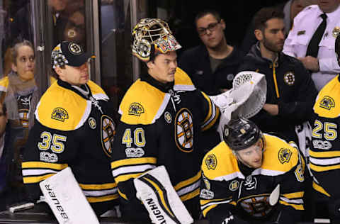 BOSTON – JANUARY 5: Bruins goalie Tuukka Rask is on the bench with less than a minute left in the game after he was pulled with the Bruins down 4-3. Backup goalie Anton Khudobin, left, and Kevan Miller, right, watch. The Boston Bruins host the Edmonton Oilers at TD Garden in Boston on Jan. 5, 2017. (Photo by John Tlumacki/The Boston Globe via Getty Images)